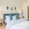 Bedroom with natural lighting and high ceilings