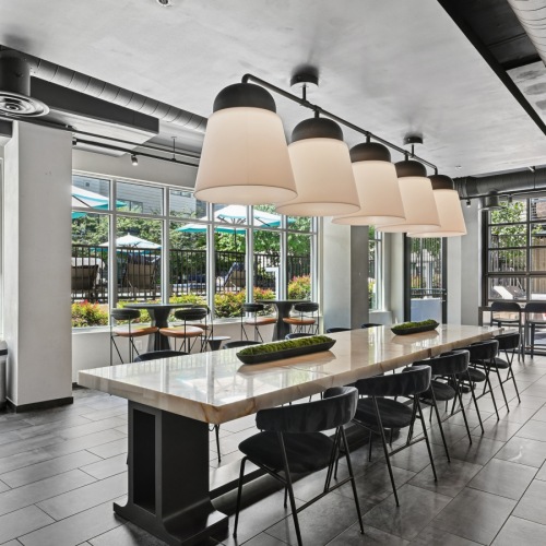 Modern resident lounge and clubroom with luxury seating at Centro Arlington