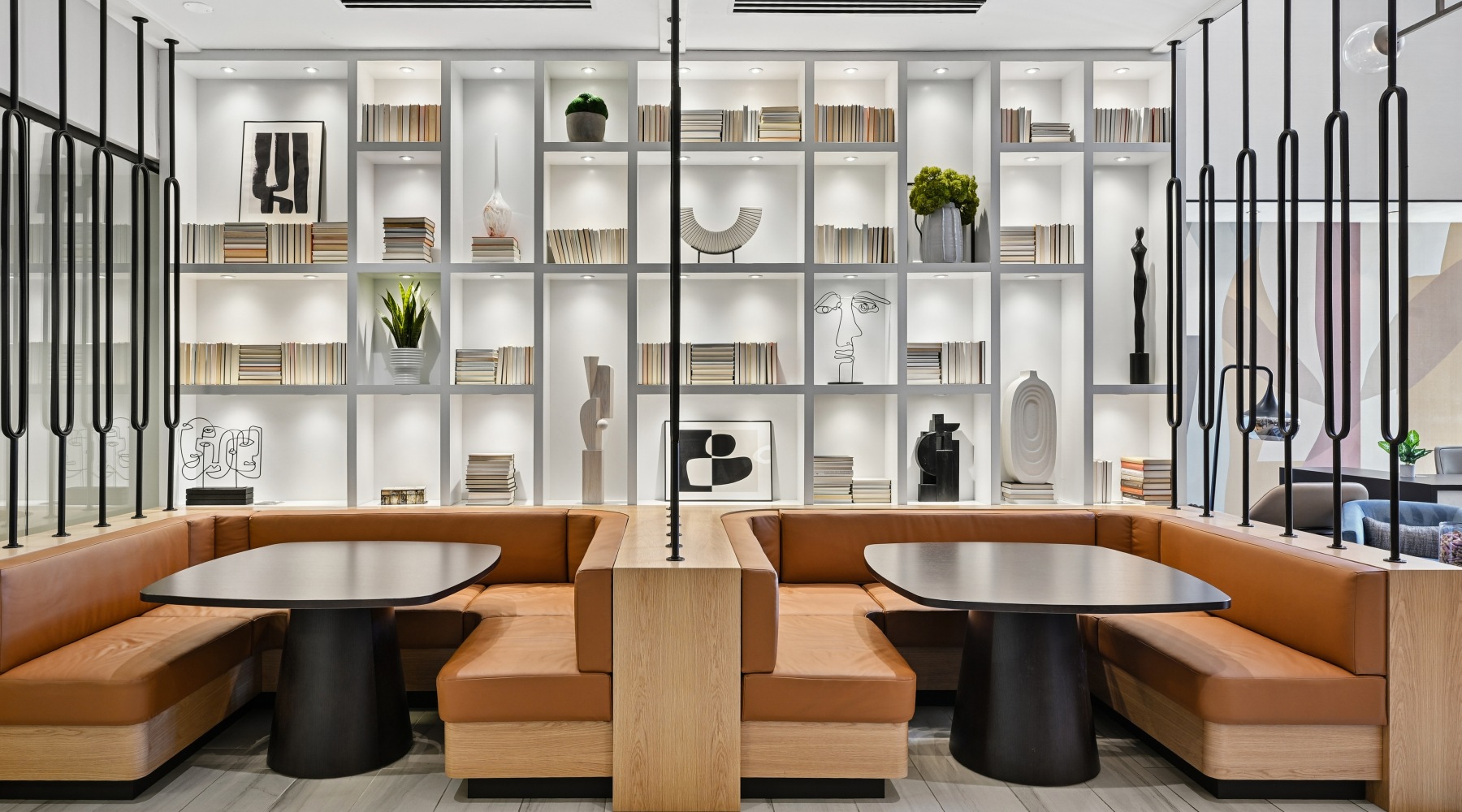 Modern resident lounge and clubroom with luxury seating at Centro Arlington