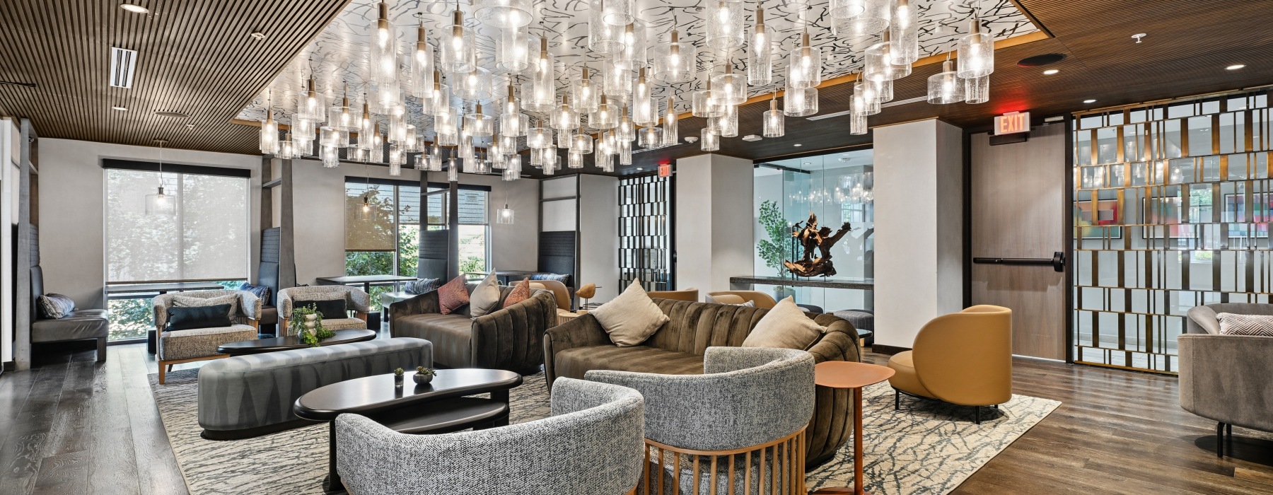 Spacious modern resident lounge and lobby area with luxury seating at Centro Arlington apartments